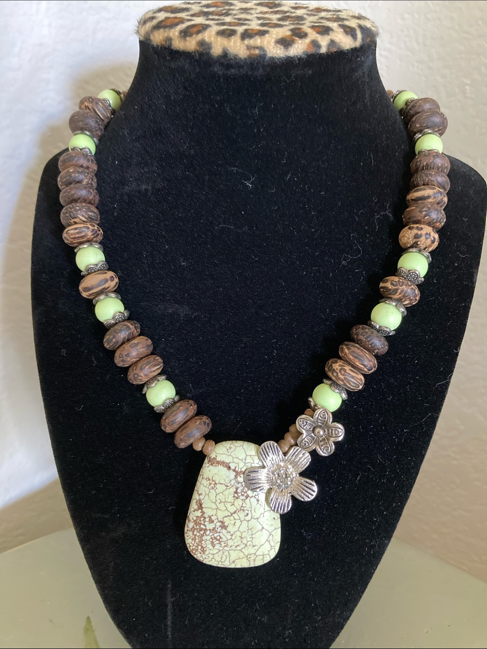 Handcrafted Green and Brown Stone Pendant Necklace - Floral Accent